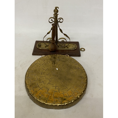 37 - A VINTAGE BURMESE BRASS WALL HANGING GONG AND STRIKER