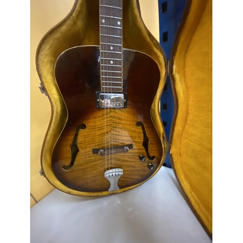 43 - AN ARTISAN ELECTRIC GUITAR WITH A HARD CASE - REPAIR TO THE HEADSTOCK