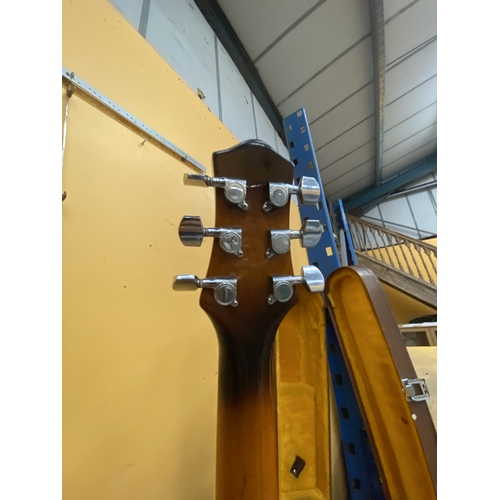 43 - AN ARTISAN ELECTRIC GUITAR WITH A HARD CASE - REPAIR TO THE HEADSTOCK