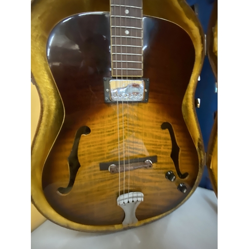 43 - AN ARTISAN ELECTRIC GUITAR WITH A HARD CASE - REPAIR TO THE HEADSTOCK