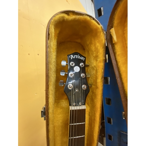 43 - AN ARTISAN ELECTRIC GUITAR WITH A HARD CASE - REPAIR TO THE HEADSTOCK