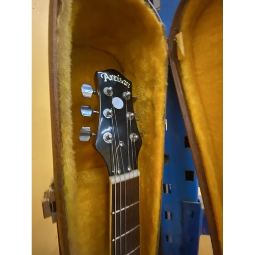 43 - AN ARTISAN ELECTRIC GUITAR WITH A HARD CASE - REPAIR TO THE HEADSTOCK