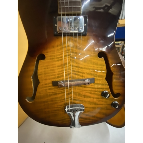 43 - AN ARTISAN ELECTRIC GUITAR WITH A HARD CASE - REPAIR TO THE HEADSTOCK