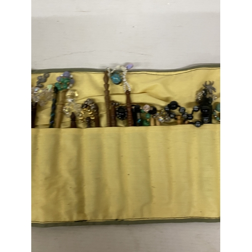 44 - A COLLECTION OF APPROX 46 WOODEN LACE MAKING BOBBINS WITH CHARMS AND SPANGLES