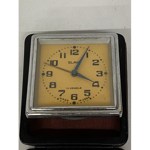46 - A VINTAGE RUSSIAN SLAVA CASED TRAVEL ALARM CLOCK