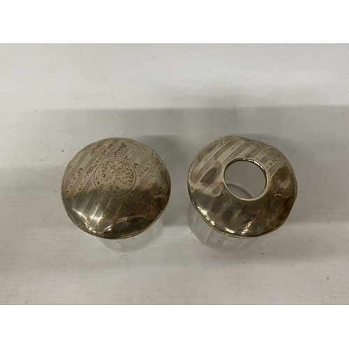 52 - TWO GLASS AND HALLMARKED BIRMINGHAM SILVER DRESSING TABLE JARS