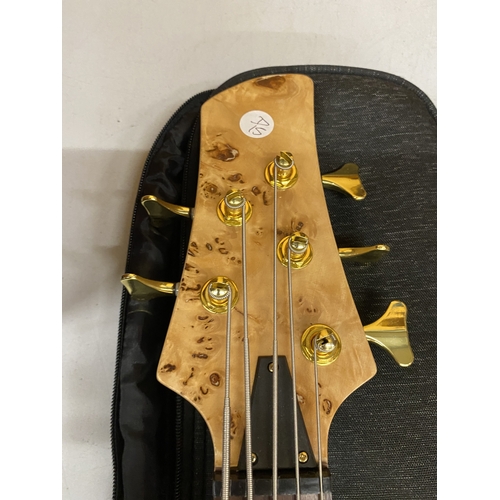 53 - AN AS NEW FIVE STRING ELECTRIC BASS GUITAR WITH CASE