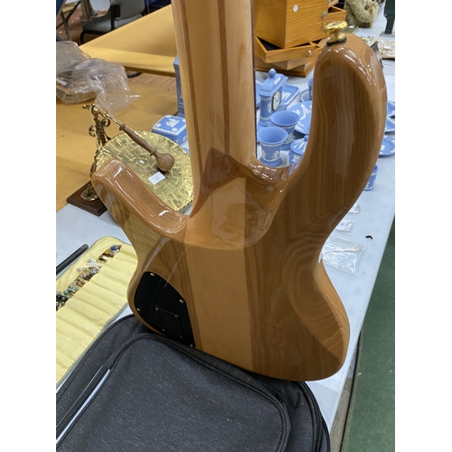 53 - AN AS NEW FIVE STRING ELECTRIC BASS GUITAR WITH CASE