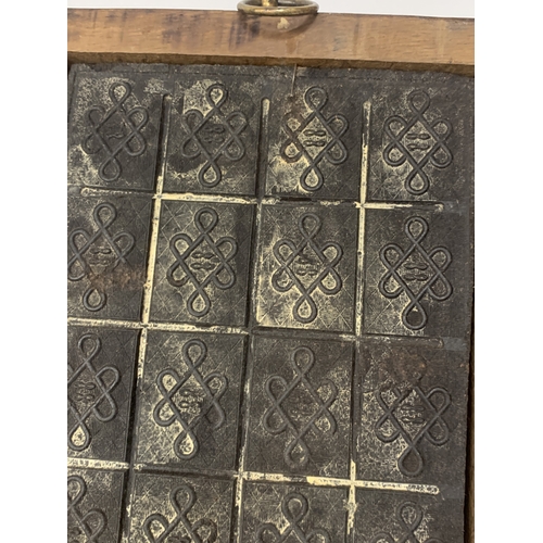  A CHINESE TEA BRICK FROM THE ZHAO LI QIAO FACTORY FRAMED