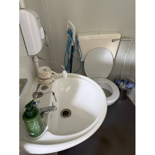 100 - A PORTABLE 20FT x 8FT OFFICE UNIT WITH TOILET FACILITIES TO ONE END AND WITH SOME OF THE OFFICE FURN... 