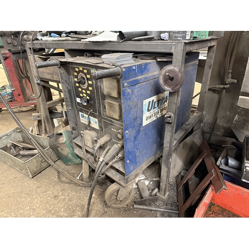 109 - AN ULTRA 480 MIG WELDER ON TROLLEY BASE WITH SEPARATE WIRE FEED, GOOD WORKING ORDER WHILST ALL DESCR... 