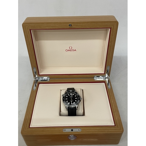301 - A GENTLEMAN'S OMEGA SEAMASTER PROFESSIONAL 300M WRISTWATCH WITH WOODEN DISPLAY BOX, DOCUMENTS, CARDS... 