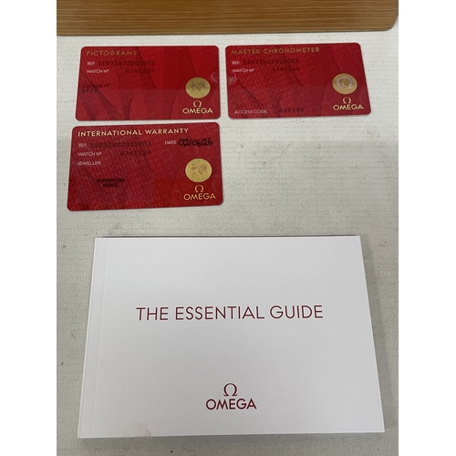 301 - A GENTLEMAN'S OMEGA SEAMASTER PROFESSIONAL 300M WRISTWATCH WITH WOODEN DISPLAY BOX, DOCUMENTS, CARDS... 