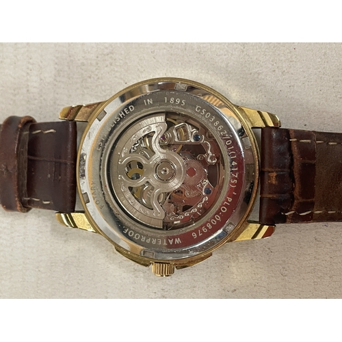 306 - A GENTLEMAN'S ROTARY AUTOMATIC SKELETON WRISTWATCH. WORKING AT TIME OF CATALOGING. FROM A DECEASED'S... 