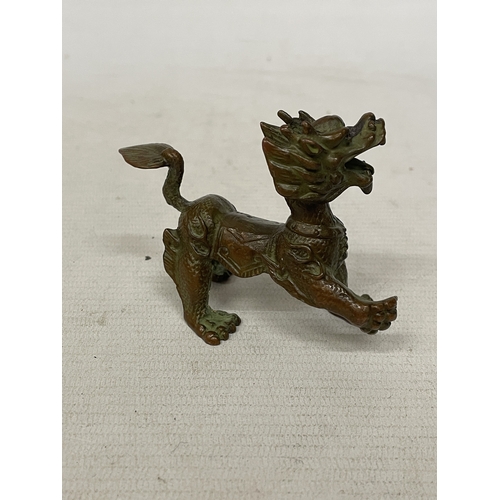 52 - AN ORIENTAL BRONZE DRAGON FIGURE