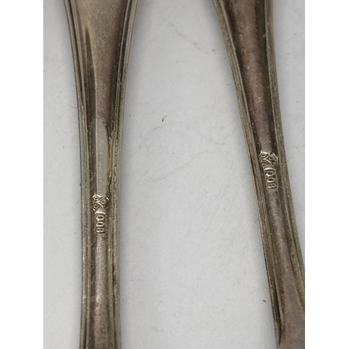 88 - FOUR MARKED 800 SILVER TEASPOONS GROSS WEIGHT 46.1 GRAMS