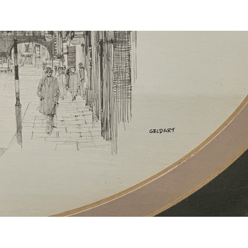 90 - A FRAMED AND OVAL MOUNTED MONOCHROME SKETCH OF A TOWNSCAPE BY WILLIAM GELDART - 32 X 28 CM