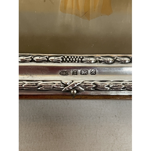 98 - A HALLMARKED BIRMINGHAM SILVER PHOTOGRAPH FRAME