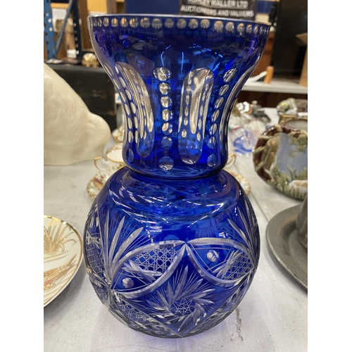 147 - A LARGE BLUE CUT TO CLEAR GLASS VASE, HEIGHT 30CM