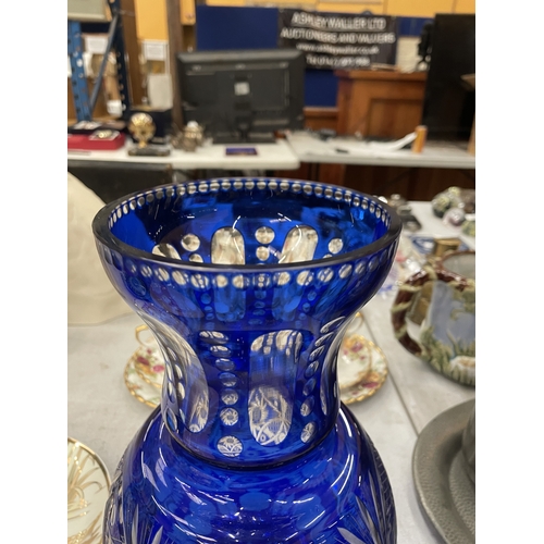 147 - A LARGE BLUE CUT TO CLEAR GLASS VASE, HEIGHT 30CM