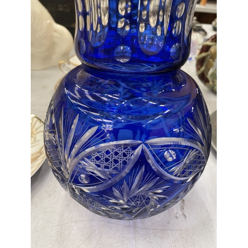147 - A LARGE BLUE CUT TO CLEAR GLASS VASE, HEIGHT 30CM