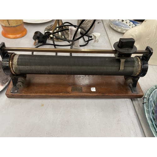 150 - A VINTAGE POTENTION METER ON A WOODEN BASE