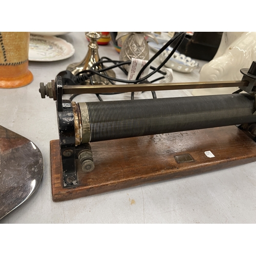 150 - A VINTAGE POTENTION METER ON A WOODEN BASE
