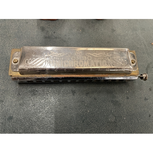 166 - A VINTAGE HARMONICA