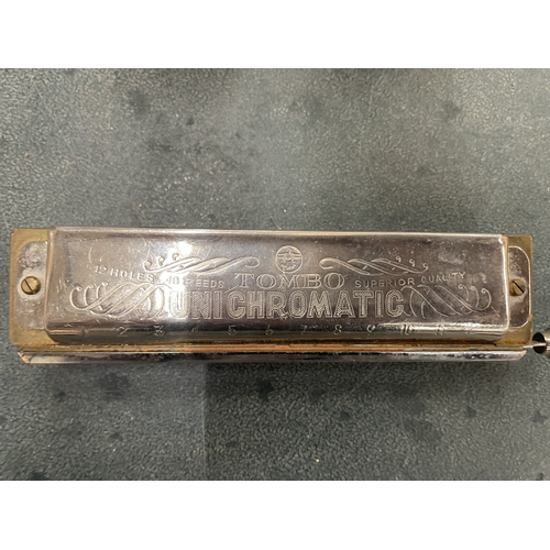 166 - A VINTAGE HARMONICA