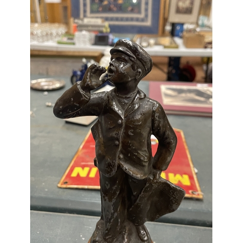 170 - A SPELTER FIGURE OF A PAPER BOY, HEIGHT APPROX 25CM