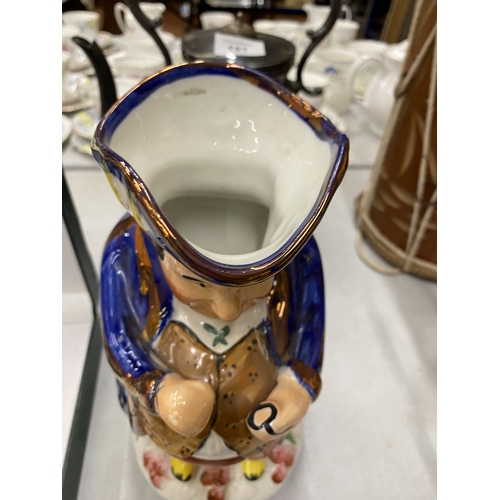 180 - A STAFFORDSHIRE SNUFF TAKER TOBY JUG
