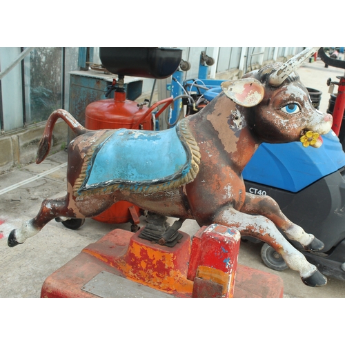 107 - A COIN OPERATED (20 PENCE) RIDE ON COW  NO VAT