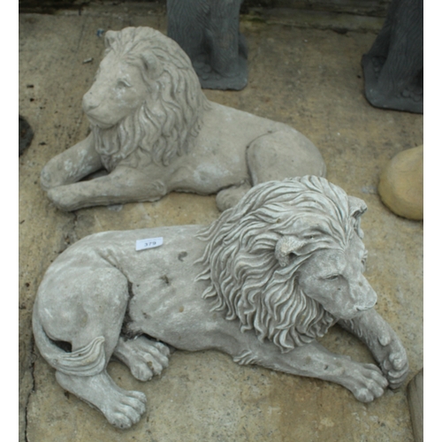379 - 2 RECUMBENT LIONS  NO VAT