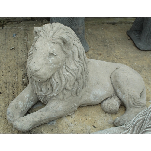 379 - 2 RECUMBENT LIONS  NO VAT