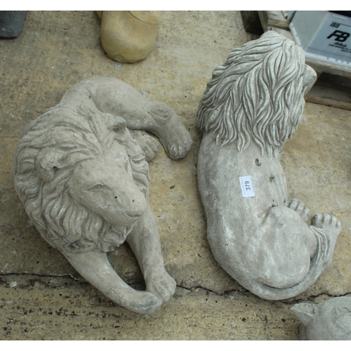 379 - 2 RECUMBENT LIONS  NO VAT
