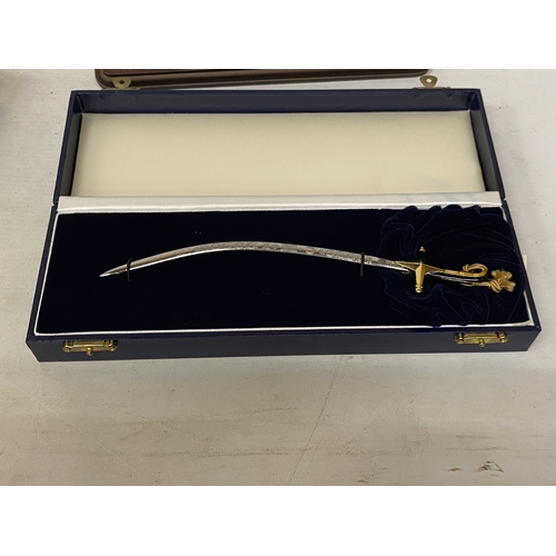 A BOXED MINIATURE DUKE OF WELLINGTON SWORD BY WILKINSON SWORD, LENGTH ...