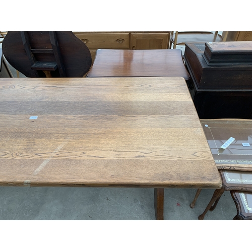 AN OAK REFECTORY TABLE ON X FRAME BASE 70