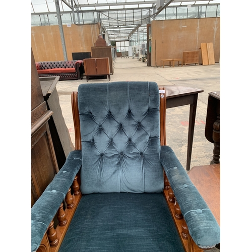 A VICTORIAN MAHOGANY UPHOLSTERED ARM CHAIR WITH BUTTON BACK AND TURNED ...