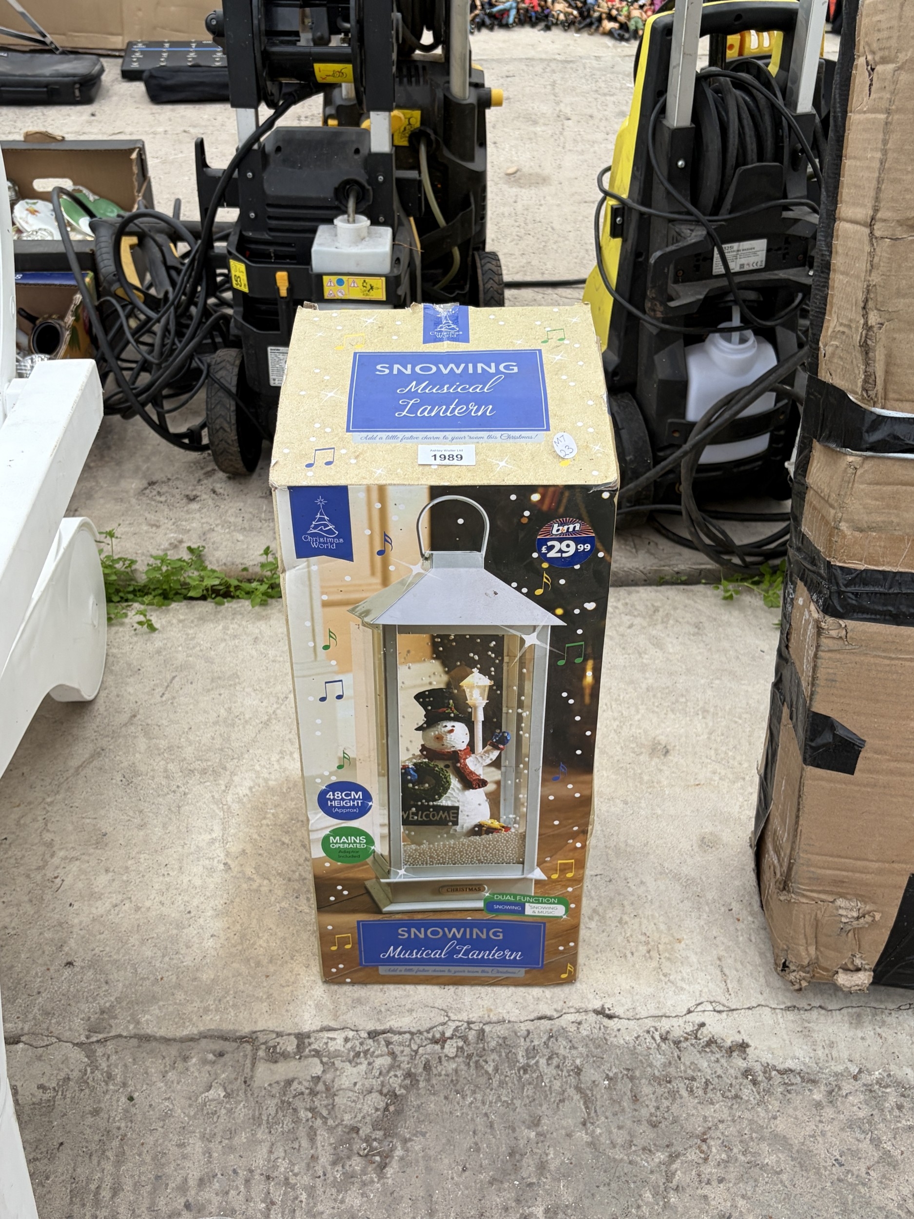 A BOXED SNOWING CHRISTMAS MUSICAL LANTERN