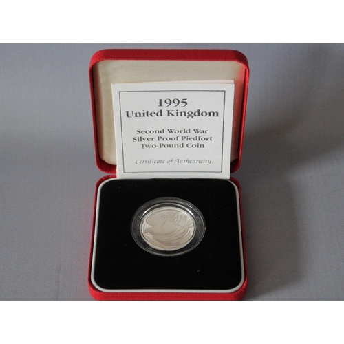 32 - A ROYAL MINT 1995 'SECOND WORLD WAR' PIEDFORT SILVER PROOF £2, with COA/Booklet, in original present... 