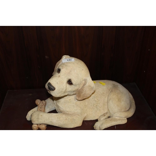 143 - A SANDICAST FIRESIDE TYPE FIGURE OF A GOLDEN LABRADOR PUPPY