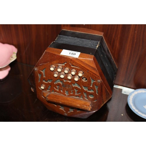 150 - A VINTAGE GERMAN MAHOGANY SQUEEZE BOX