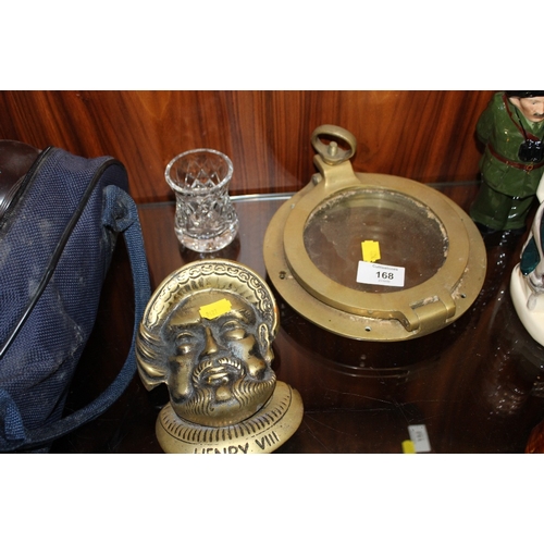 168 - A VINTAGE BRASS PORT HOLE, TOGETHER WITH A BRASS HENRY VIII SHAPED DOOR KNOCKER