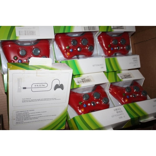 110 - A TRAY OF BOXED GAMING CONTROLLERS