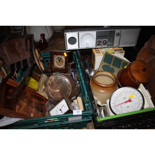 111 - TWO TRAYS OF COLLECTABLES TO INCLUDE MANTLE CLOCKS, WOODEN CAR FIGURE ETC