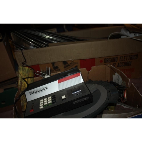 114 - TWO BOXES OF MODEL RAILWAY TRACK AND POWER UNITS TO INCLUDE HORNBY