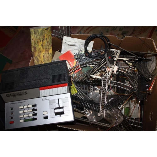 114 - TWO BOXES OF MODEL RAILWAY TRACK AND POWER UNITS TO INCLUDE HORNBY