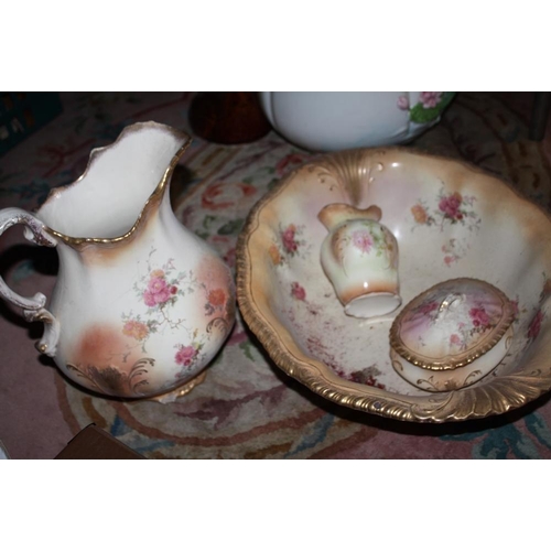 116 - A VINTAGE FLORAL JUG AND BOWL SET
