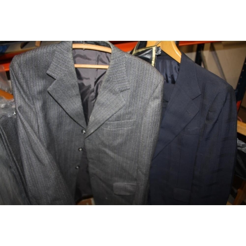 84 - A COLLECTION OF GENTS CLOTHING TO INCLUDE A BUSH OVER COAT, SUITS ETC