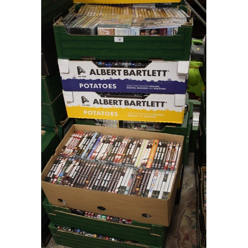 88 - TEN TRAYS OF DVDS
